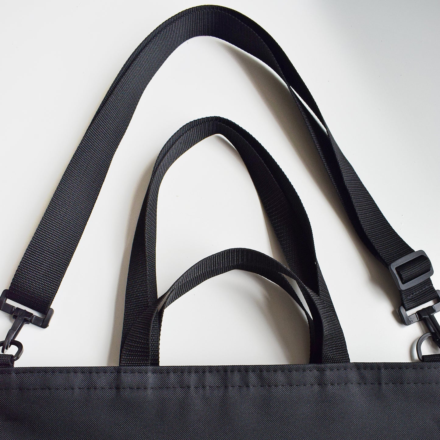 shoulder strap and along bag handles