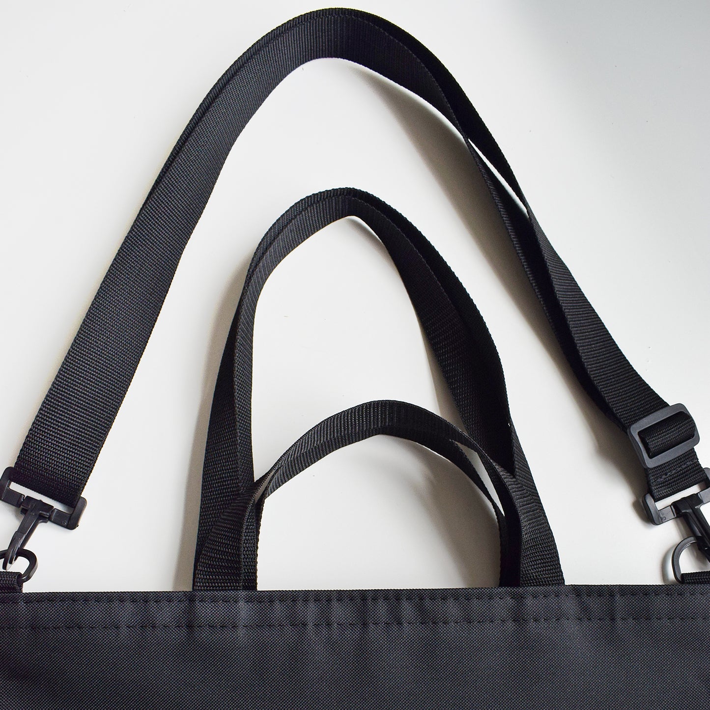 shoulder strap and along bag handles 