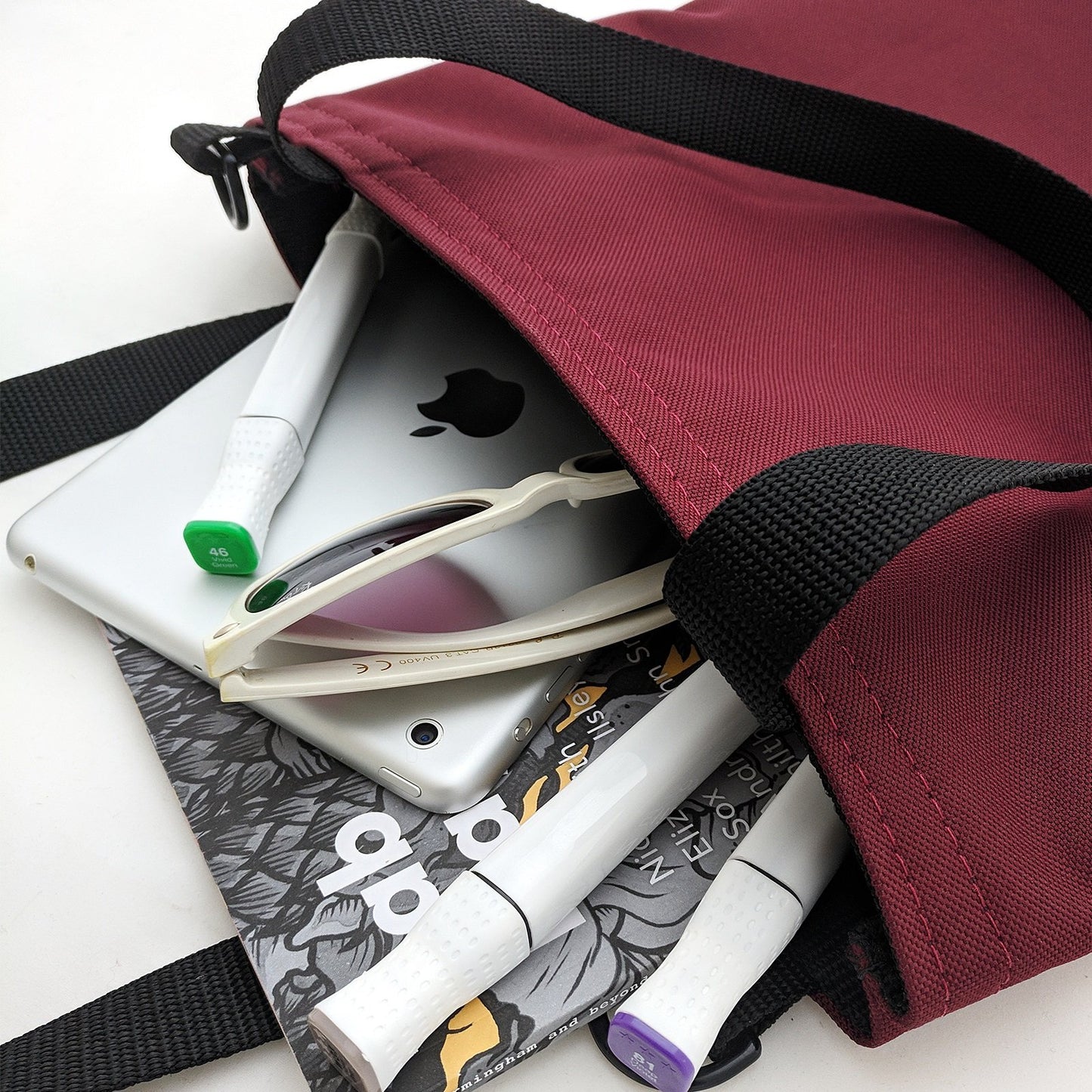 open tote bag with items inside Goodstart Jones